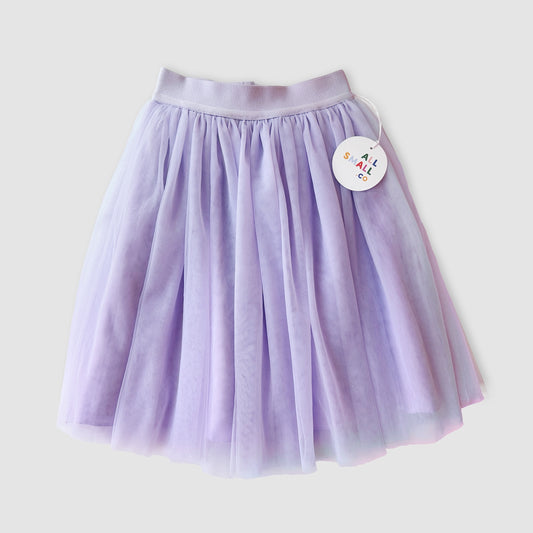 A midi length tutu skirt in purple with a soft elastic waistband, displayed against a white background.