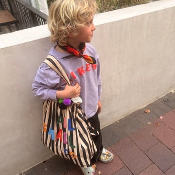 Gift Wrap in Cinched Cotton Tote